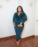 Front view of emerald illusion mesh pants set highlighting velvet trim and sculpted waist fit