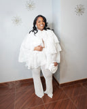 Curvy woman wearing dramatic white chiffon blouse