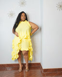 Curvy woman wearing yellow plus size ruffle two-piece set