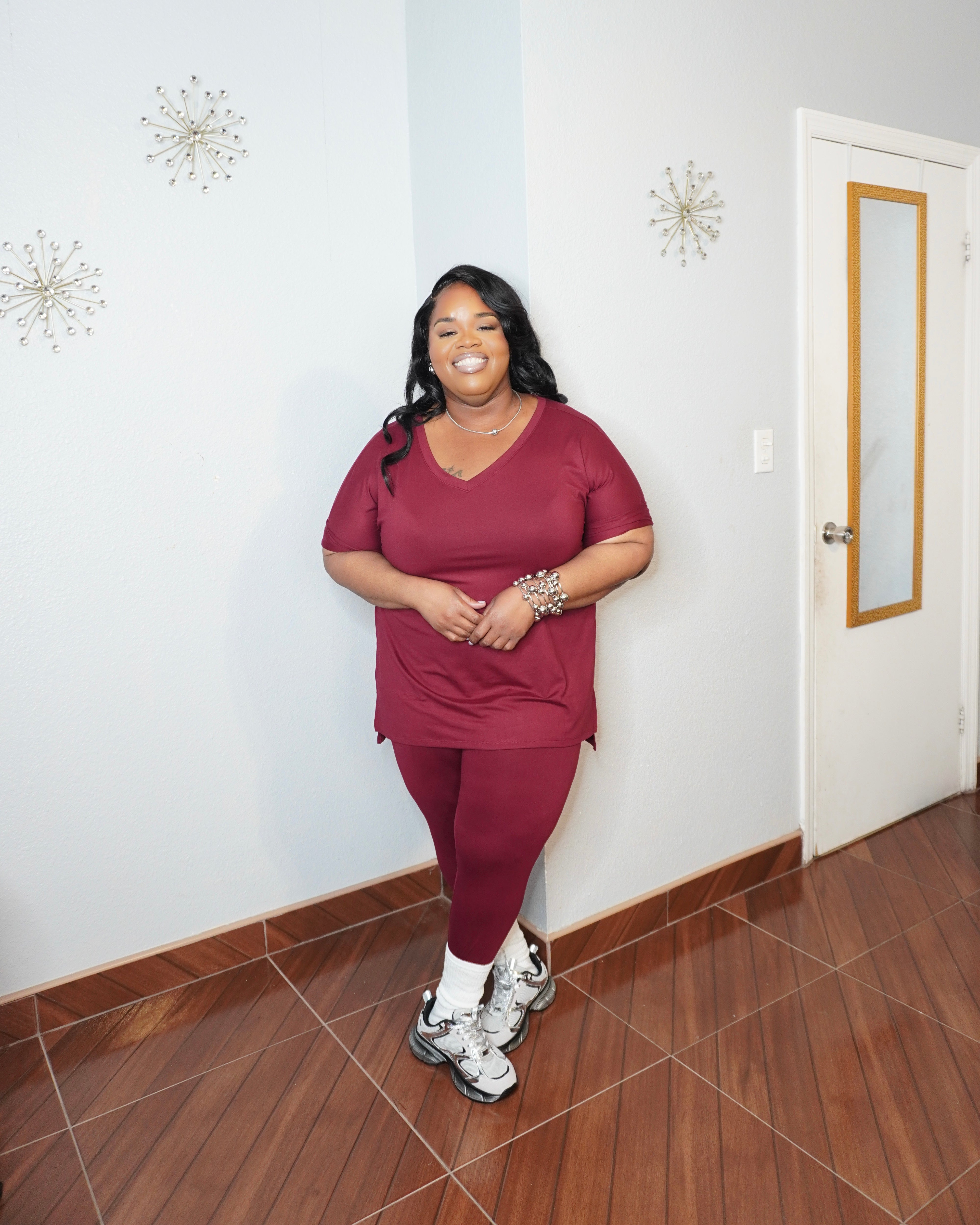 Plus size V-neck legging set with relaxed top and fitted leggings front view