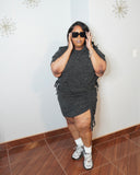 Model wearing plus size ruched skirt set adjusting sunglasses full body view