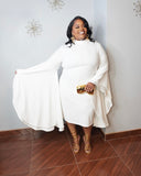 Plus size white midi dress with dramatic angel sleeves