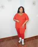 Back view of plus size V-neck top and fitted leggings set