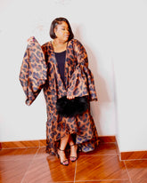 Plus size leopard print statement kimono with dramatic bell sleeves and high-low ruffle hem front view