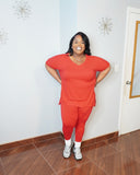 Side view of plus size legging set showing stretch and relaxed fit top