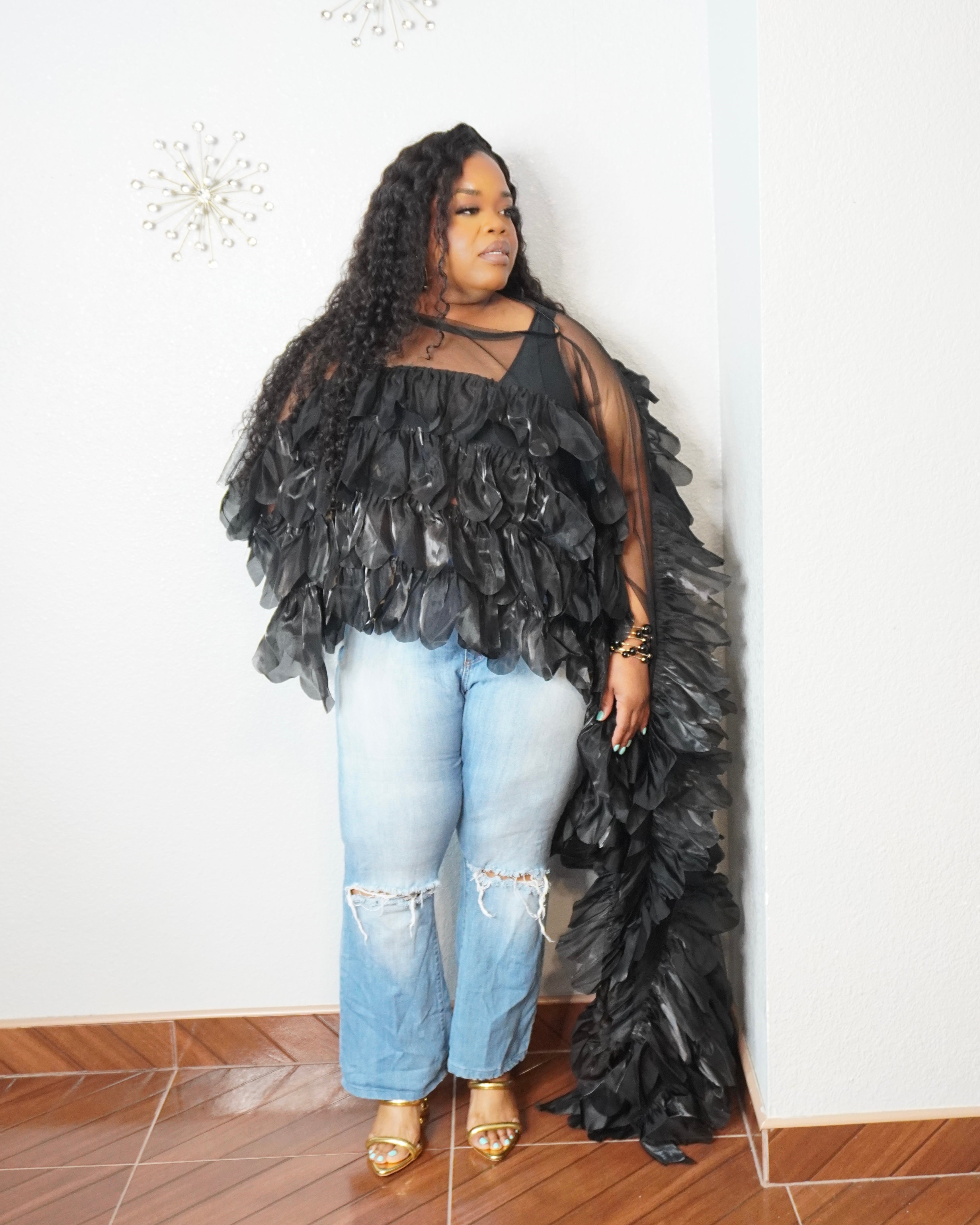 Plus size black asymmetrical statement blouse with sheer sleeves and dramatic 3D texture