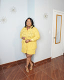 Plus size yellow short set styled with gold heels