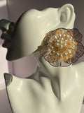 Pearl Éclat oversized gold flower earring with sculptural floral petals and champagne-toned bead detailing