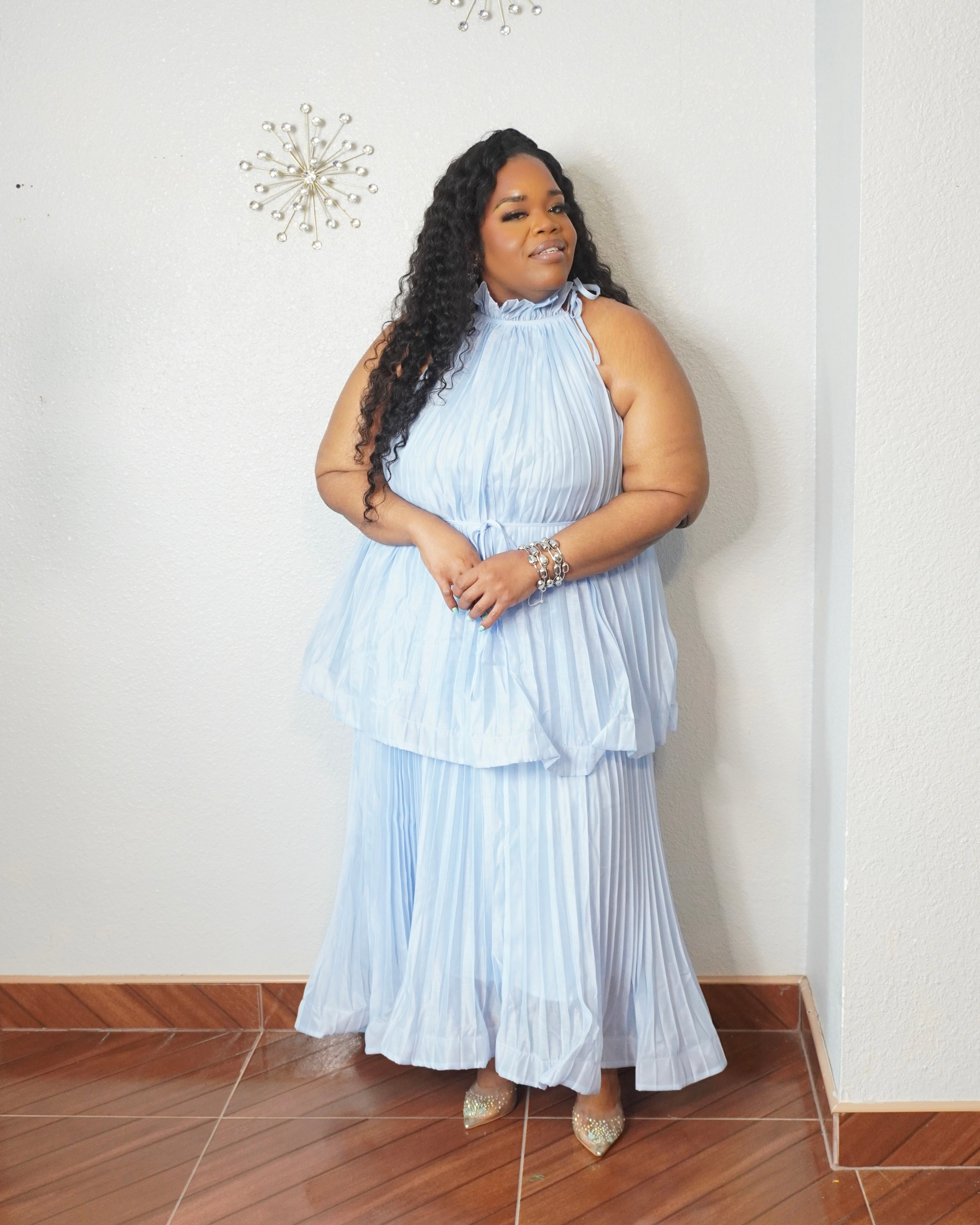 Curvy woman wearing elegant blue maxi dress