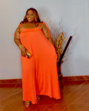 Plus size orange oversized wide leg jumpsuit with stretch fabric from Lysaire boutique