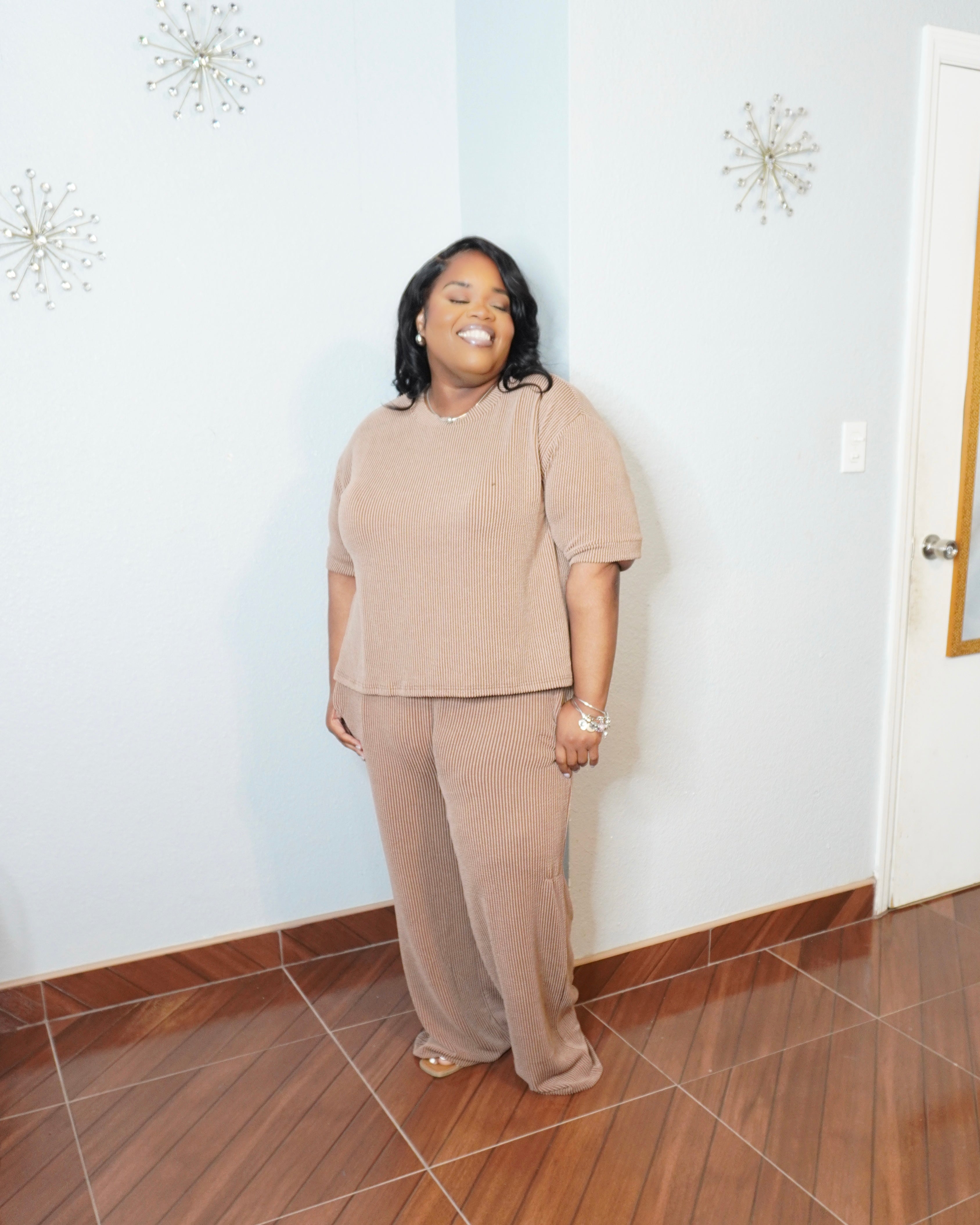 Full body view of plus size ribbed drawstring set with wide leg silhouette