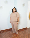 Full body view of plus size ribbed drawstring set with wide leg silhouette
