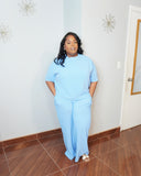 Plus size ribbed knit pant set with round neck top and wide leg pants front view