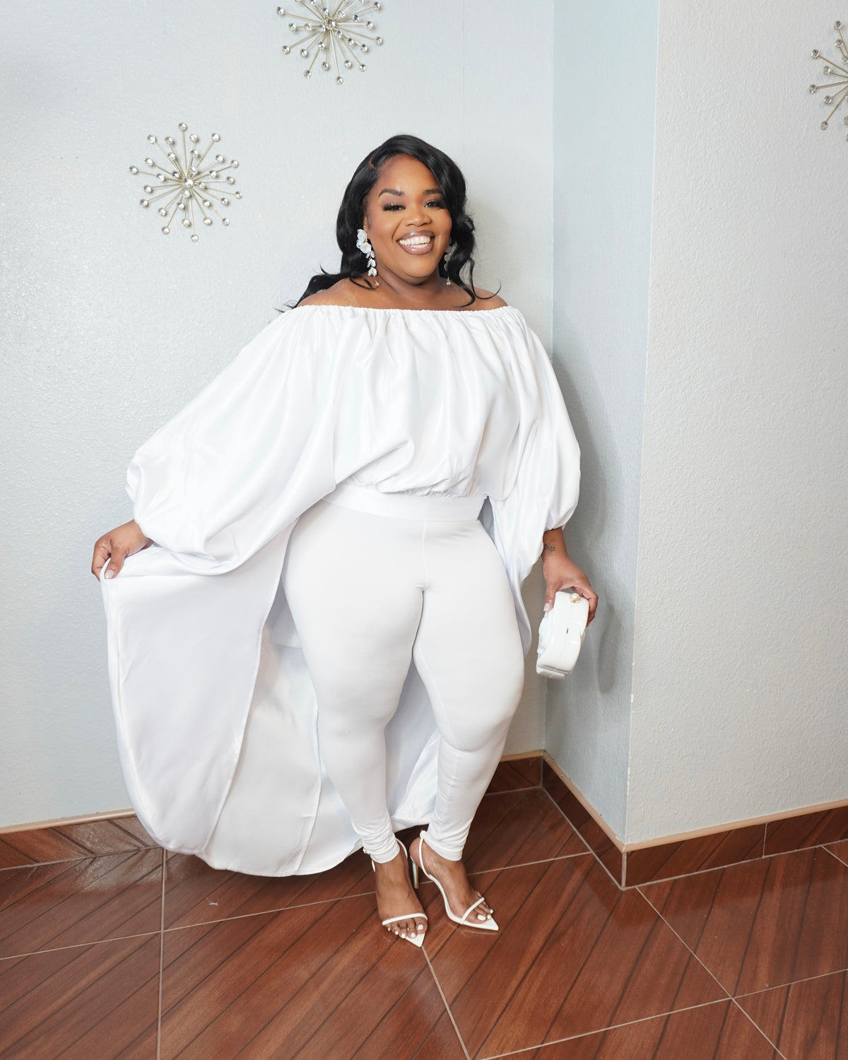 Plus size off shoulder statement top with oversized balloon sleeves