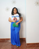 Curvy woman styling a trendy graphic tee with wide leg pants