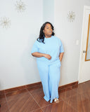 Front view of plus size ribbed two piece set with relaxed top and flowy pants