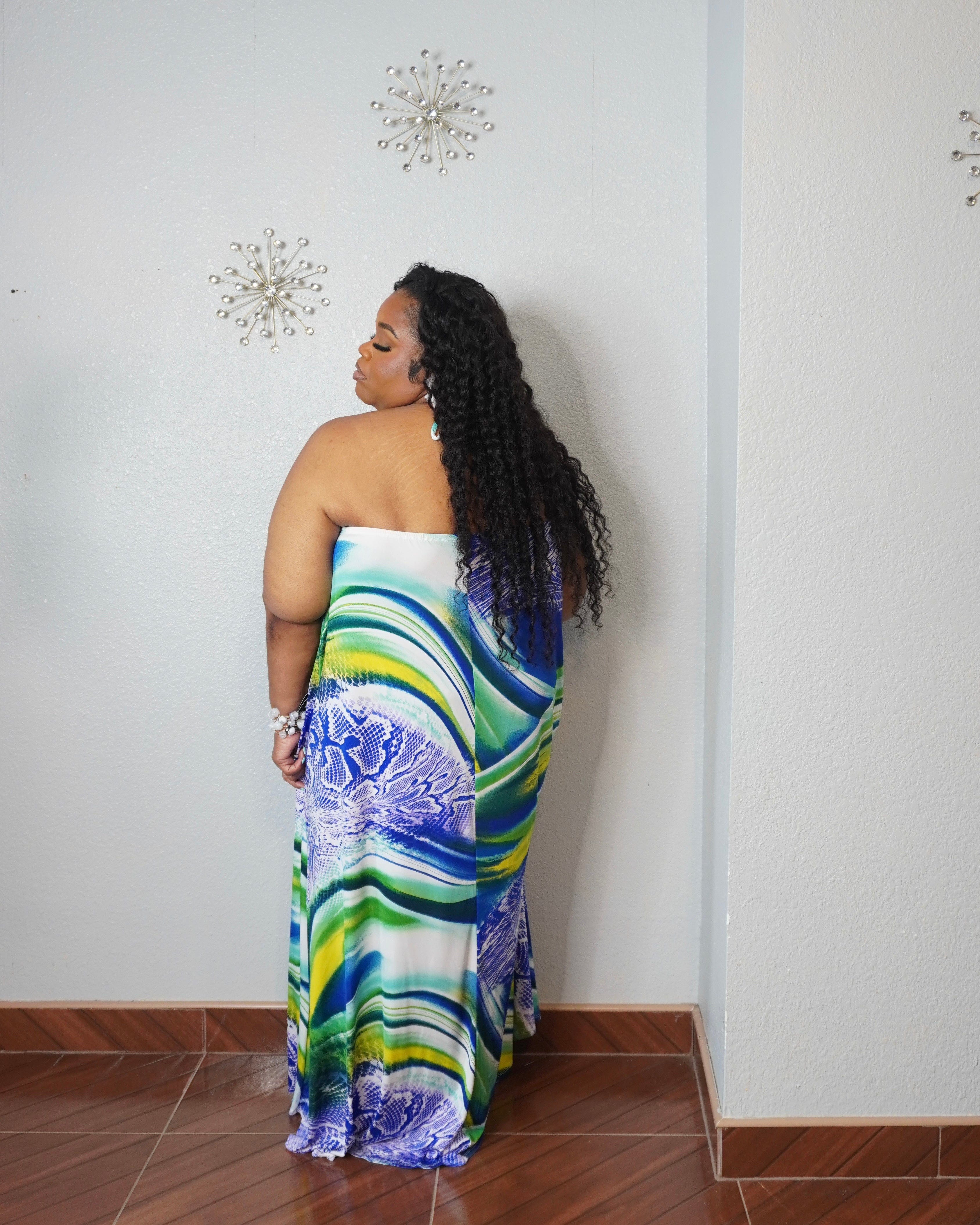 Blue green printed maxi dress styled for a vacation outfit