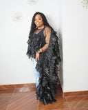 Side view of plus size black 3D statement top with dramatic floor-length cascading detail