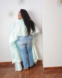 Back view of plus size two-piece cascading top with long layered high-low silhouette