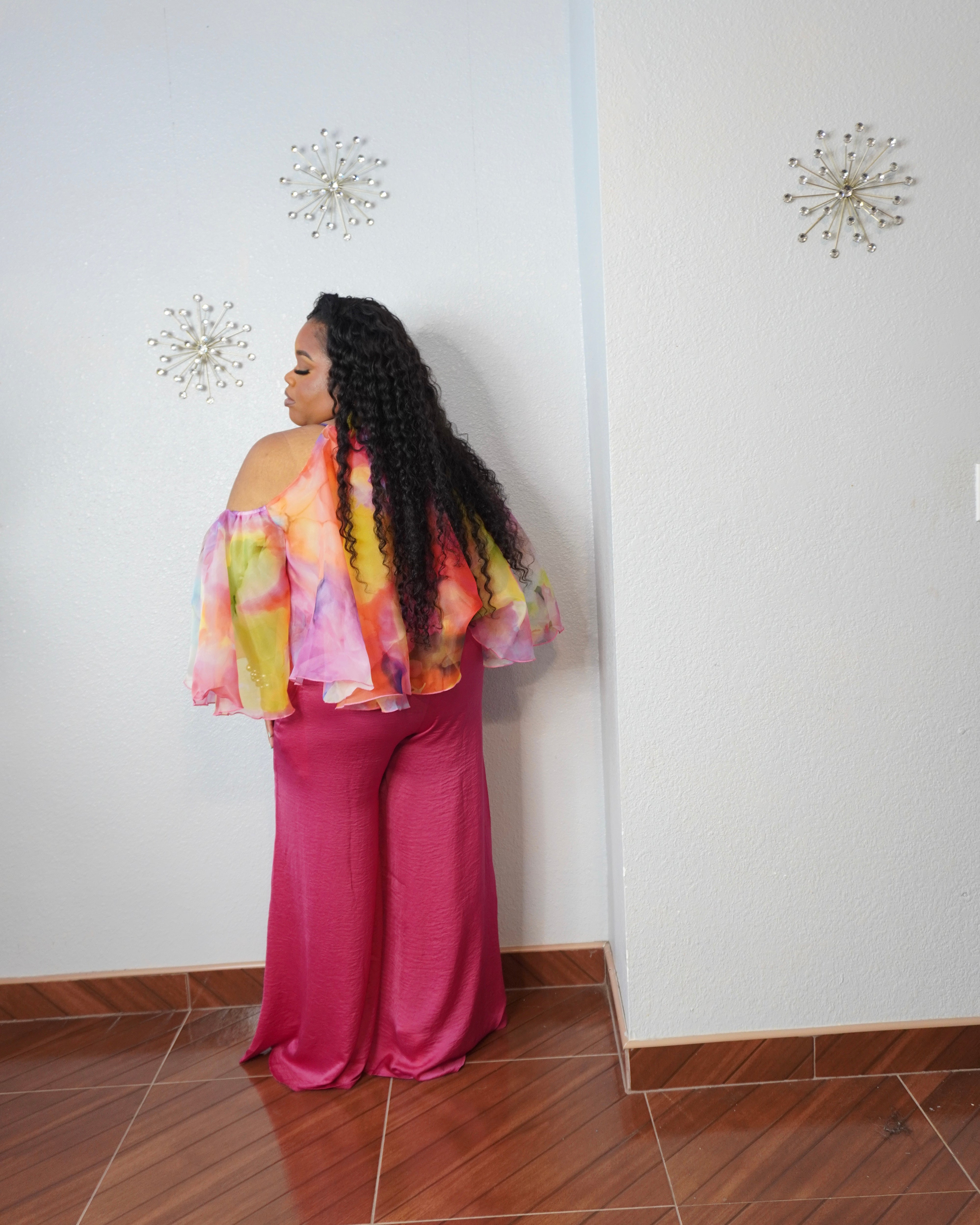 Back view of plus size pink organza top with elegant flowing sleeves