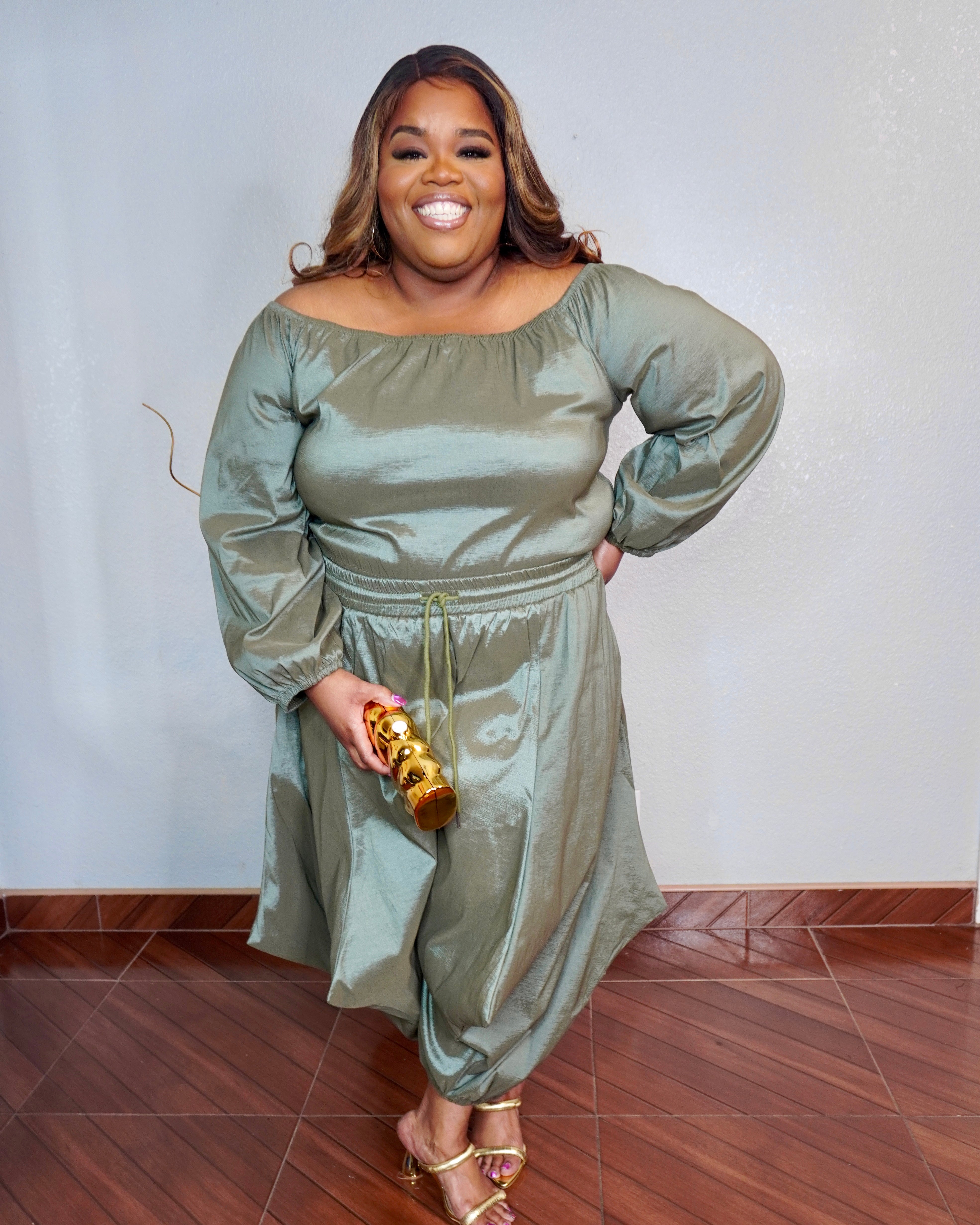 Plus size olive off shoulder pant set with wide leg pants and elastic waist styled with heels
