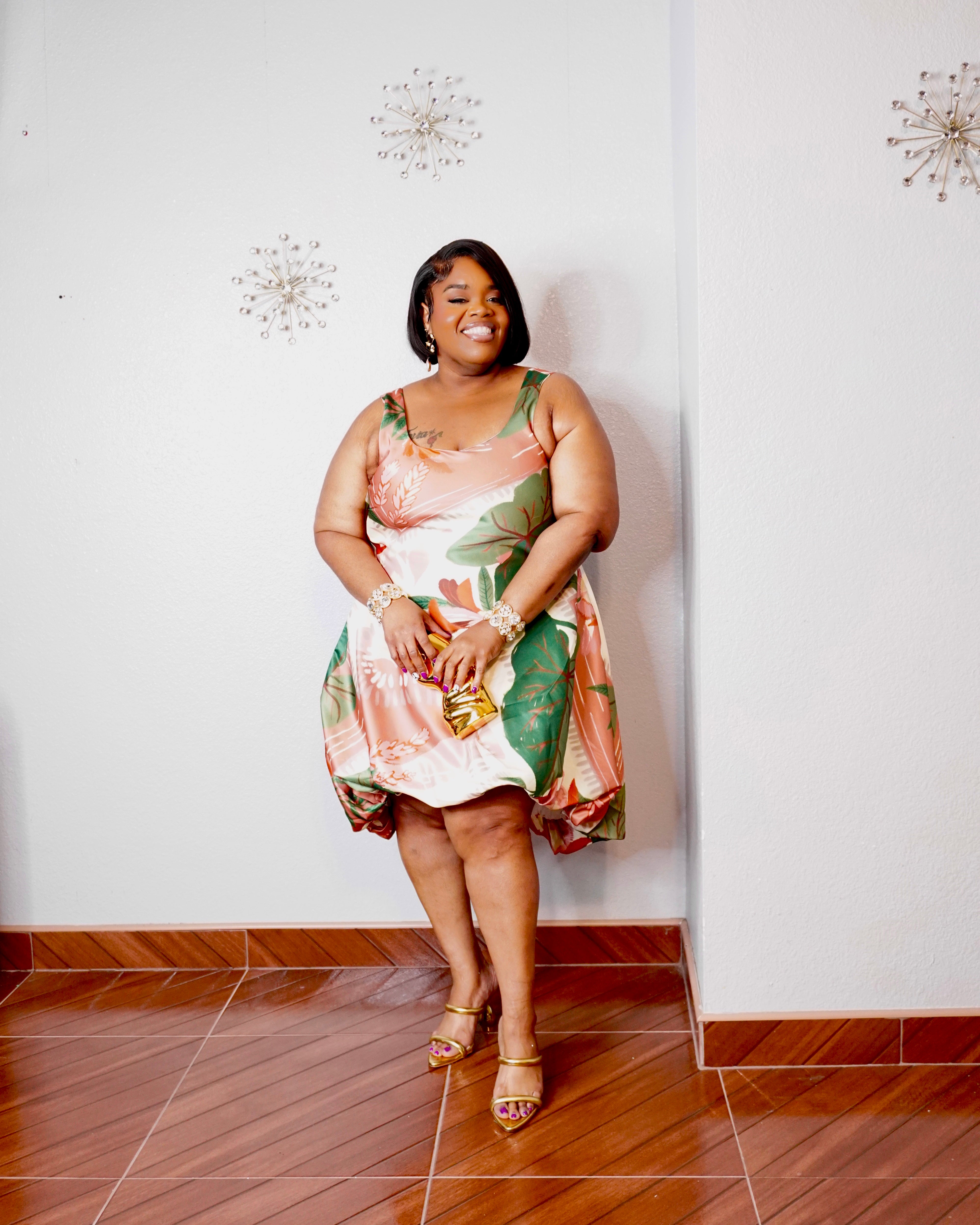 Talia plus size tropical dress styled with gold heels