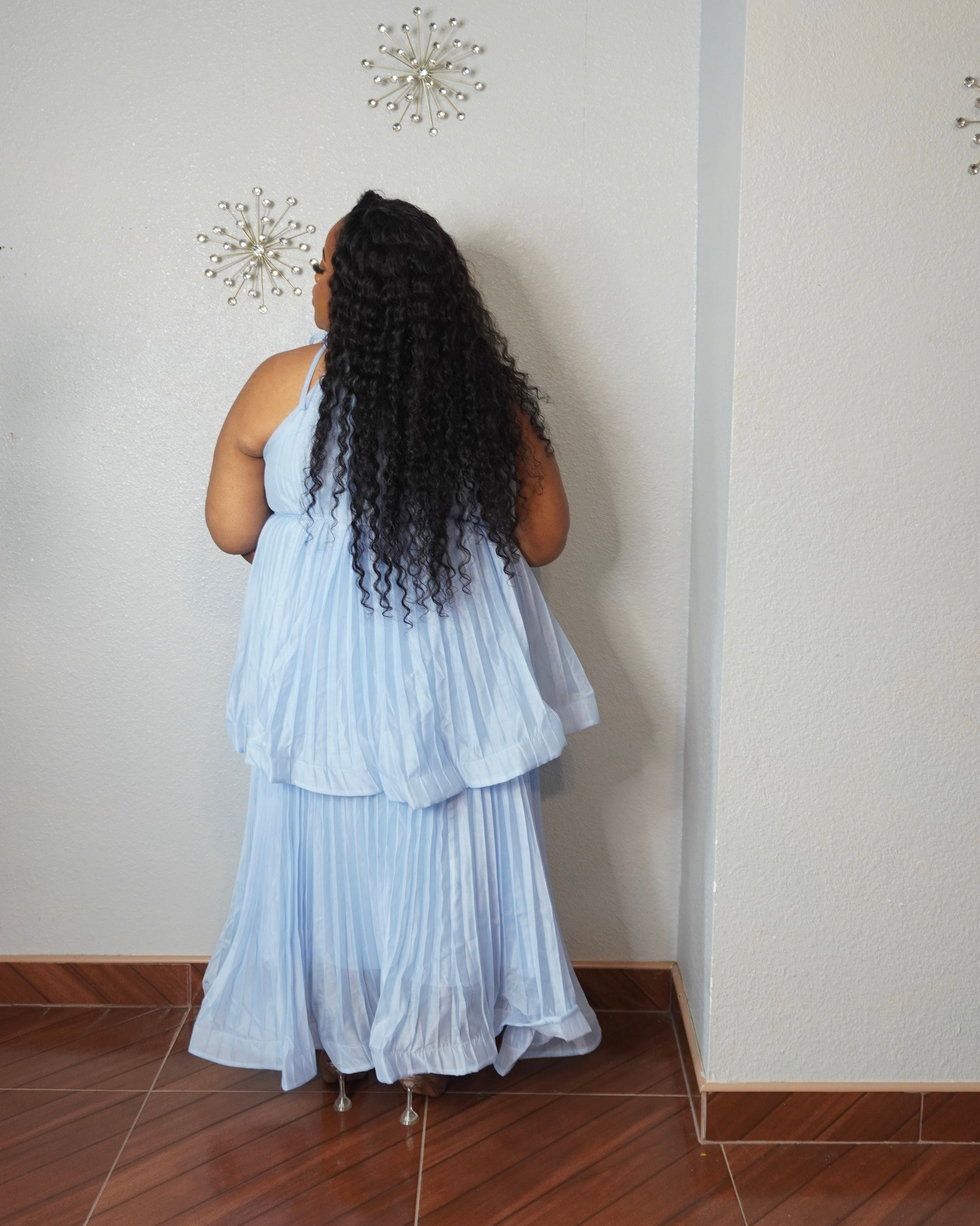 Back view of light blue pleated maxi dress