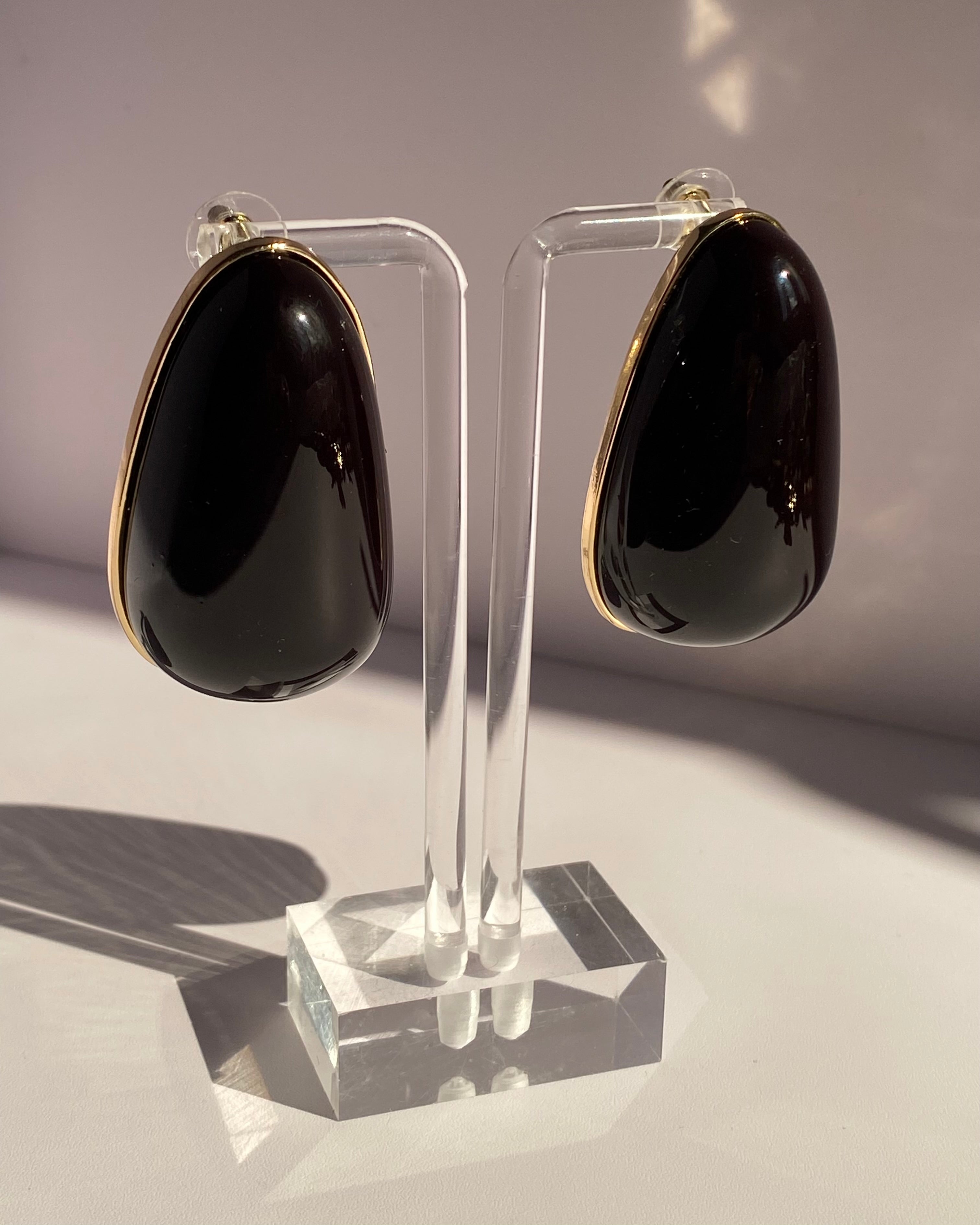 Black and ivory oversized teardrop statement stud earrings with gold-tone borders available at Lysaire