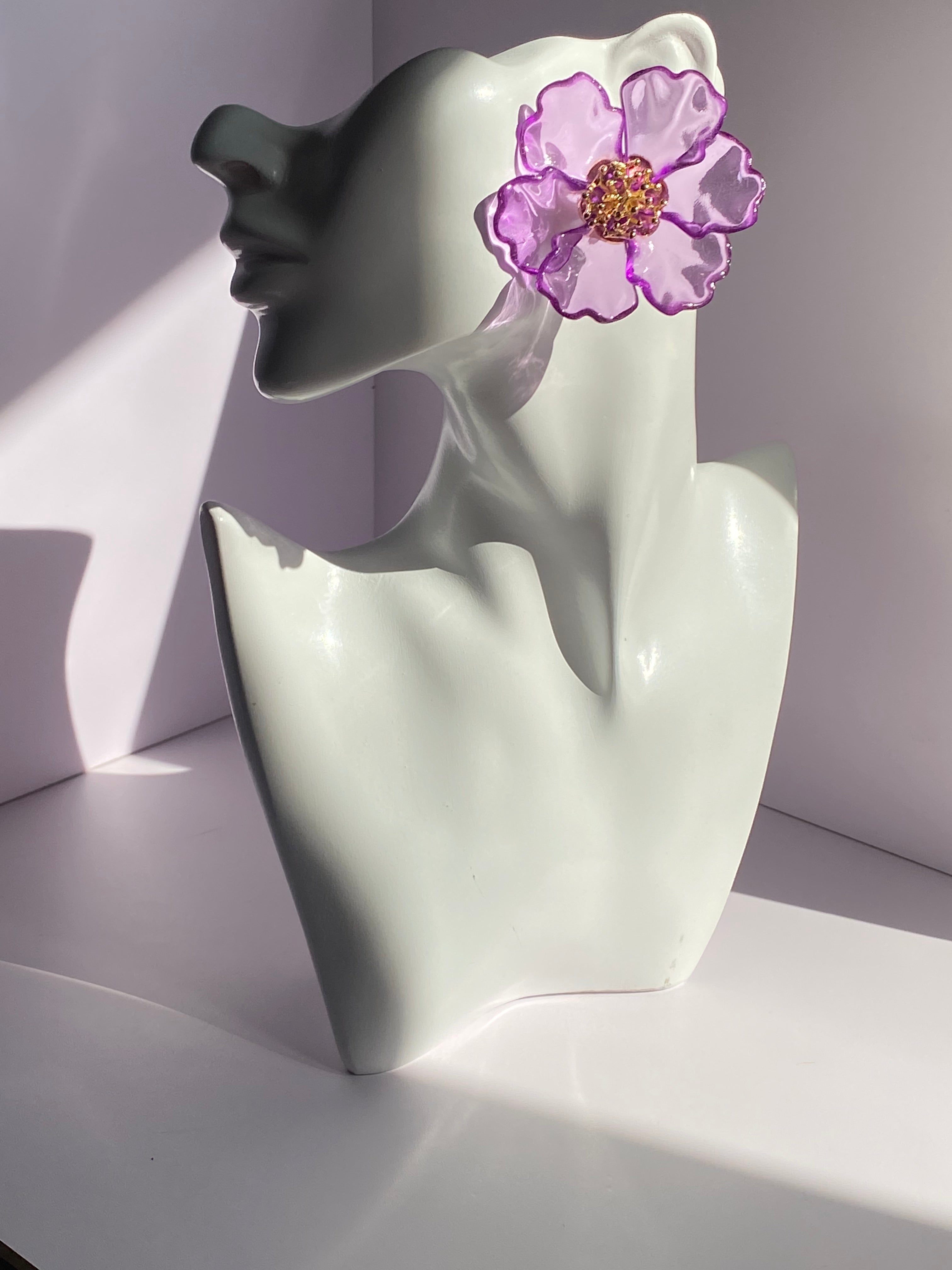 Oversized lavender flower statement earring with translucent purple petals and intricate gold-tone center