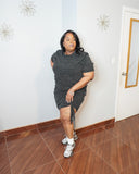 Side angle of plus size skirt set showing adjustable ruching and fitted silhouette