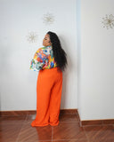 Plus size tall-friendly green wide-leg pants styled with white blouse